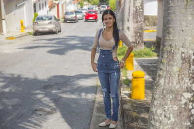 Clothed pitch-dark teen Denisse Gomez shows off the brush attracting face wide jean overalls