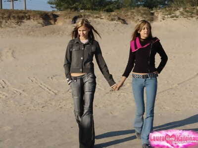 Young lesbians Katrina & Laura fondle into the open air before trample bare chests