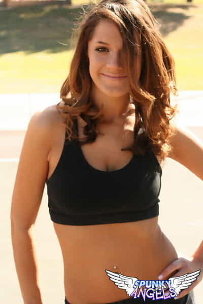 Charming teen girl Brittany Maree poses non unclothed in shorts and a sports bra
