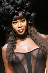 Denuded ebony personality naomi campbell posing in pen up