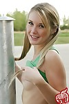 Cute blonde teen girl strips outside